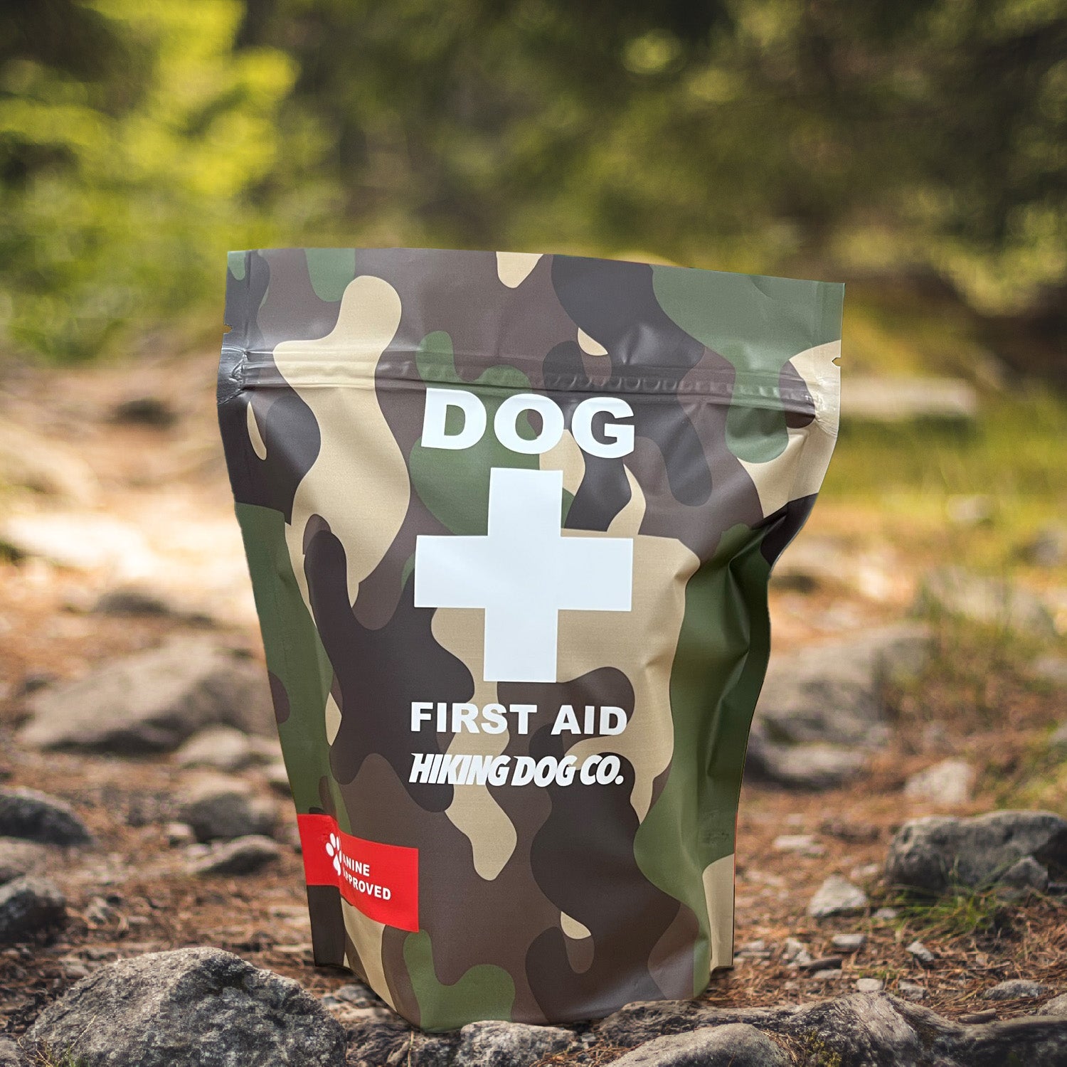 Hiking Dog Co's Dog First Aid Kit in camo resealable pouch. Contents are protected from the elements in the pouch. 