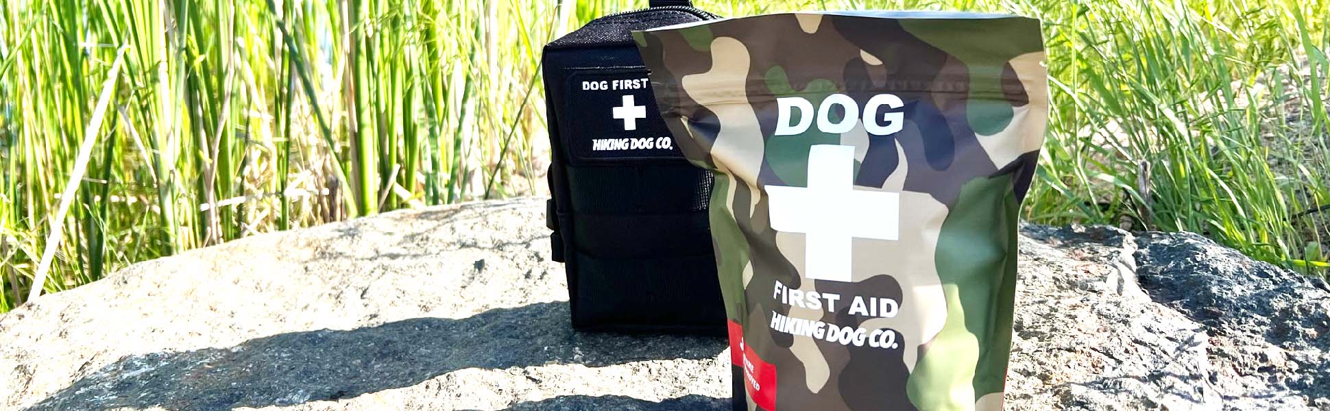 Dog First Aid kit from Hiking Dog Co. Optional molle pouch in stealth black color is shown alongside the kit.