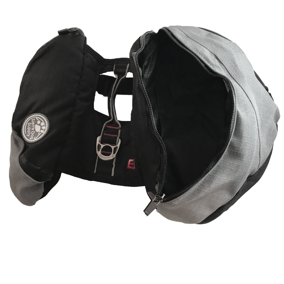 photo showing an open bag on one side of the doggles extreme backpack for dogs
