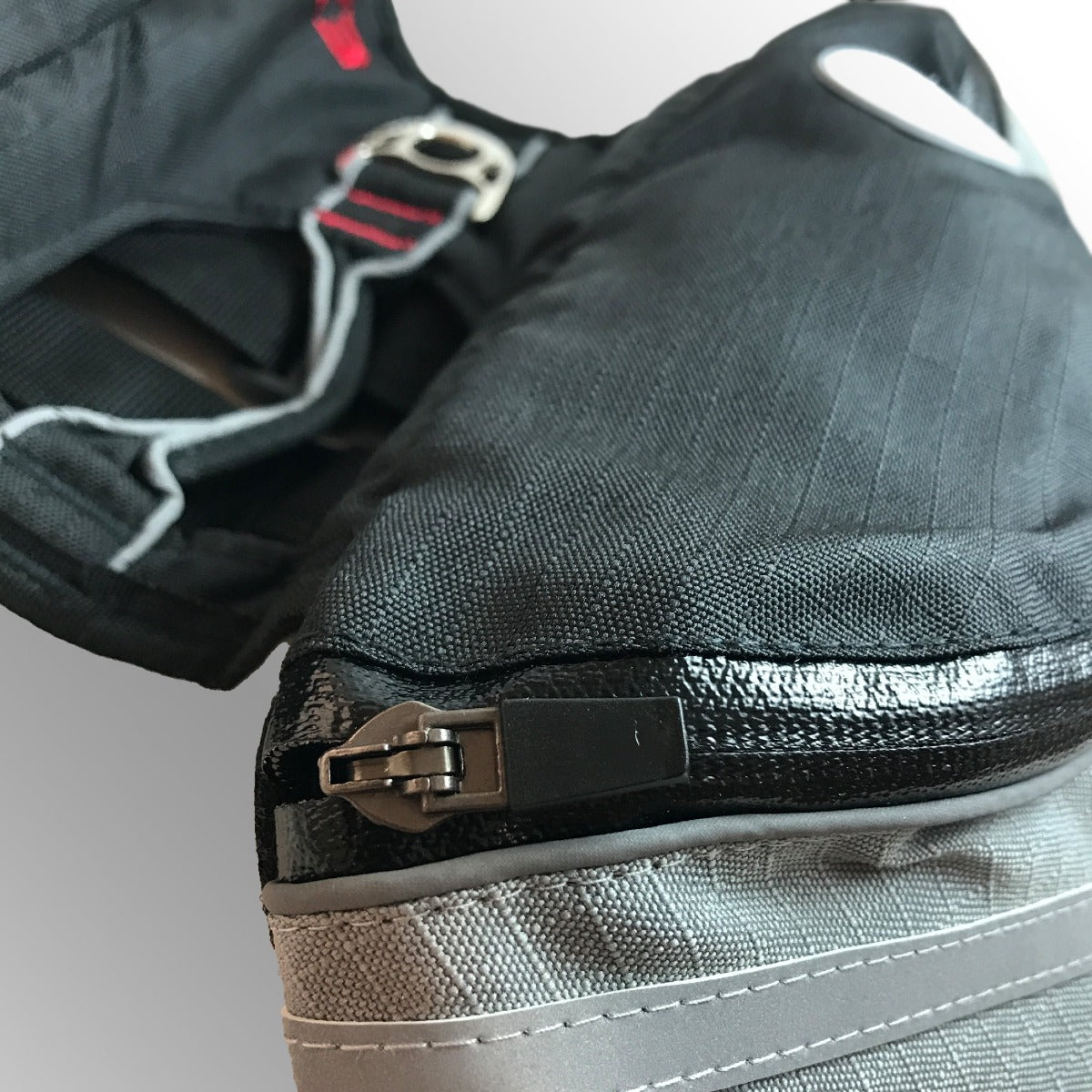 close up view of the material and zipper of the doggles extreme backpack for dogs